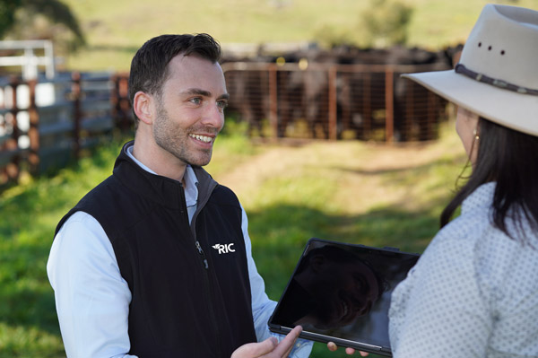 RIC employee talking with customer